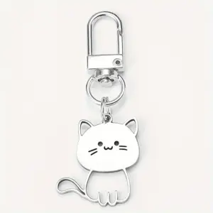Silberner Schlüsselanhänger mit Karabiner und sitzender Katze, Gesicht weiß