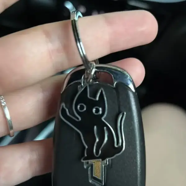 Geschenke für Katzenliebhaber: Schlüsselanhänger Katze mit Messer – Bild 3