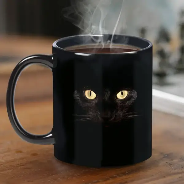 Geschenke für Katzenliebhaber: Keramiktasse mit Katzenaugen – Bild 3