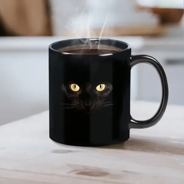 Geschenke für Katzenliebhaber: Keramiktasse mit Katzenaugen – Bild 4