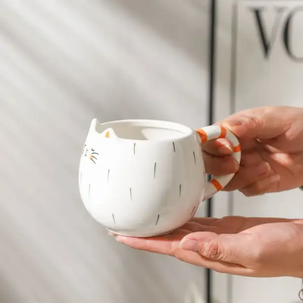 Geschenke für Katzenliebhaber: Tasse mit gestreiftem Henkel – Bild 5
