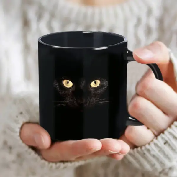 Geschenke für Katzenliebhaber: Keramiktasse mit Katzenaugen – Bild 5
