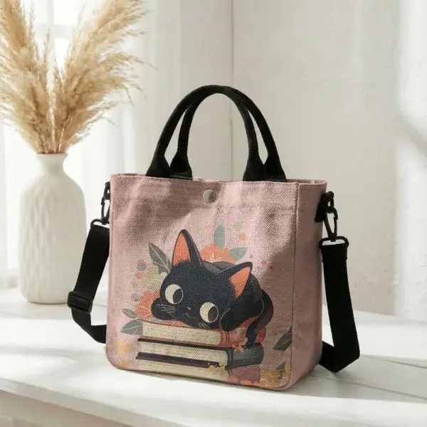 Geschenke für Katzenliebhaber: Handtasche mit Katze auf Büchern – Bild 5