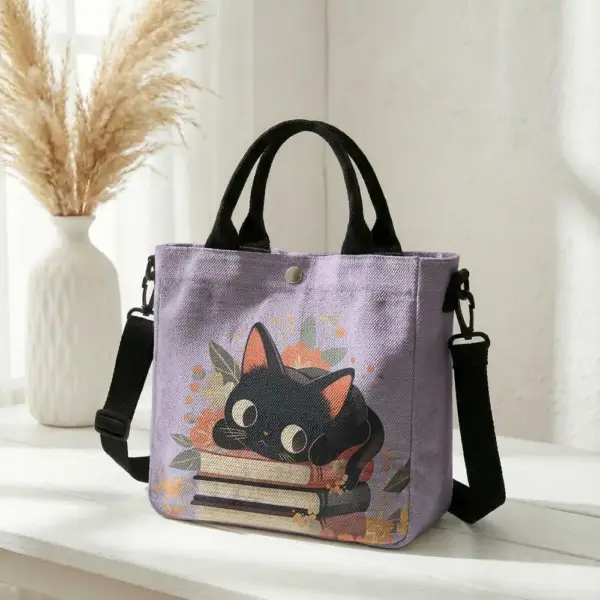 Geschenke für Katzenliebhaber: Handtasche mit Katze auf Büchern – Bild 9