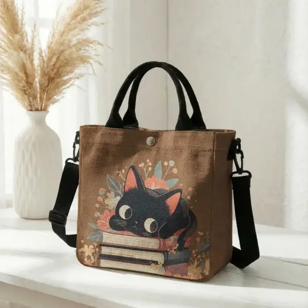 Geschenke für Katzenliebhaber: Handtasche mit Katze auf Büchern – Bild 12