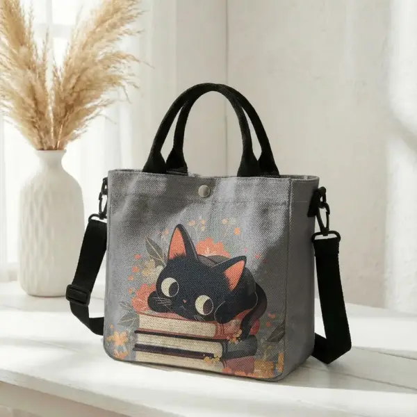 Geschenke für Katzenliebhaber: Handtasche mit Katze auf Büchern – Bild 11