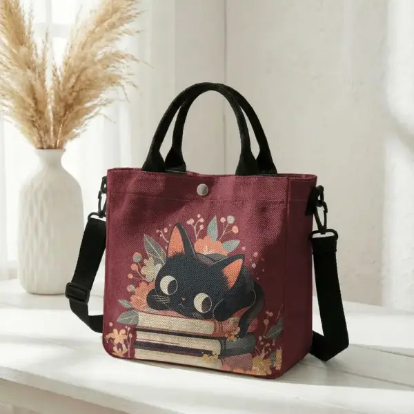 Geschenke für Katzenliebhaber: Handtasche mit Katze auf Büchern – Bild 14