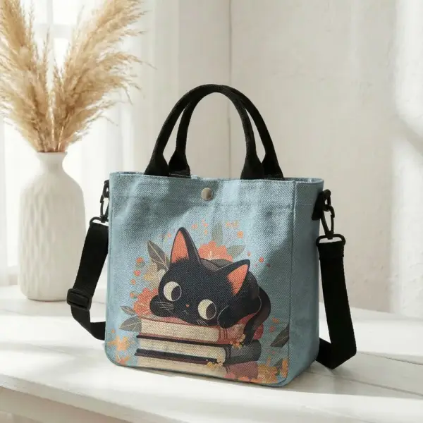 Geschenke für Katzenliebhaber: Handtasche mit Katze auf Büchern – Bild 13