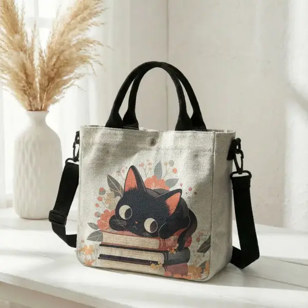 Geschenke für Katzenliebhaber: Handtasche mit Katze auf Büchern – Bild 16