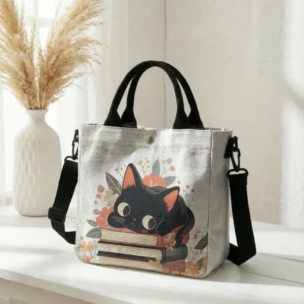 Geschenke für Katzenliebhaber: Handtasche mit Katze auf Büchern – Bild 15